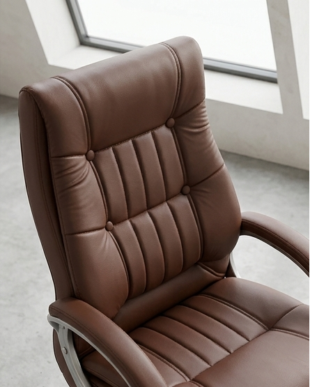 Brown office chair shown from multiple angles in a modern interior setting.