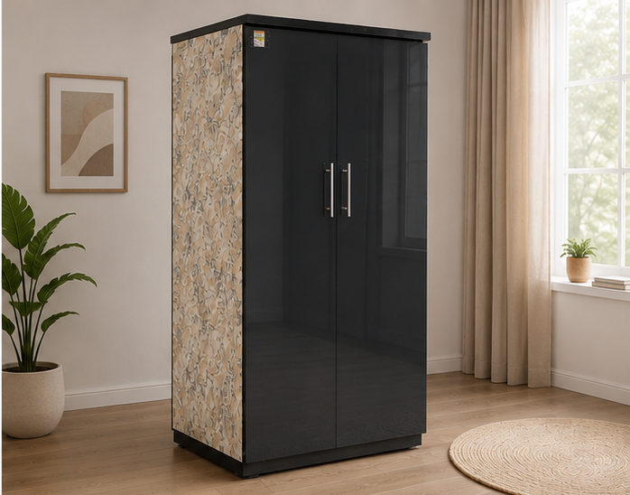 A tall two-door wardrobe or cabinet with glossy black doors and a textured beige side panel, shown in a styled room with wood flooring, curtains, a window, and framed wall art.