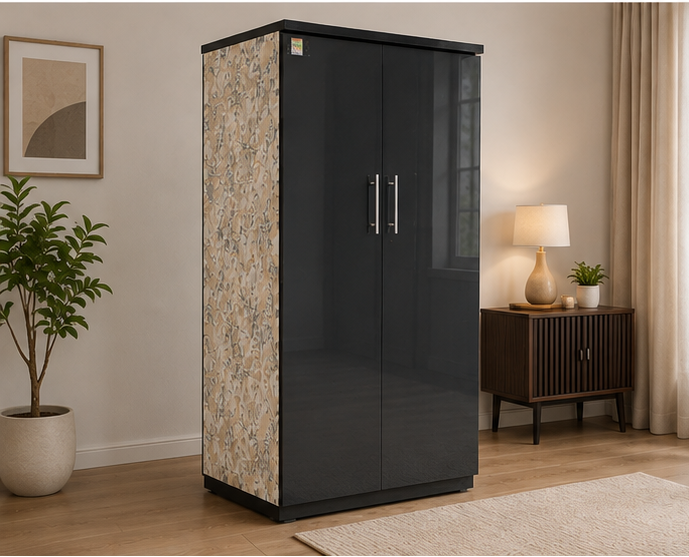 A tall two-door storage cabinet with glossy black doors and a beige floral-patterned side panel, shown in a styled living room setting with a side table, lamp, plant, and curtains.