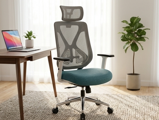 Ergonomic office chair in a home office setting with a desk and laptop.