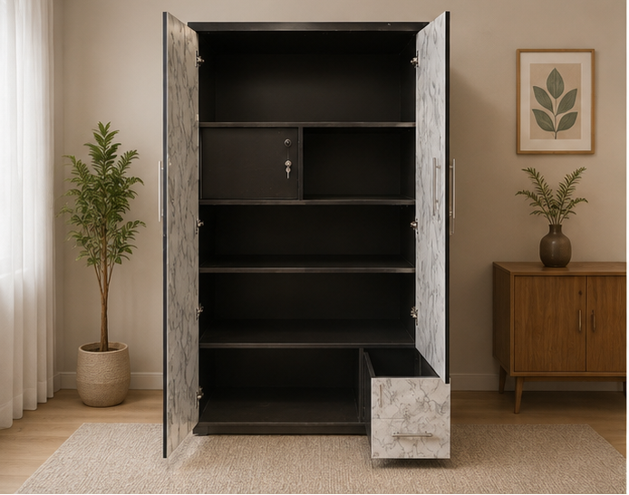 A tall black storage cabinet with marble-patterned doors and drawer front, shown open in a styled room with a plant, framed wall art, and a wooden side table.