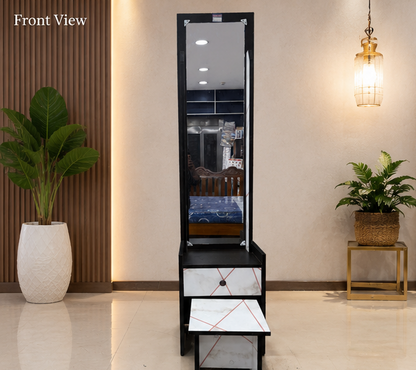 Black and white storage unit with mirror in a room with plants and a lamp.