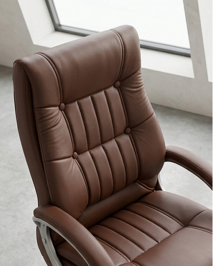 Brown office chair shown from multiple angles in a modern interior setting.